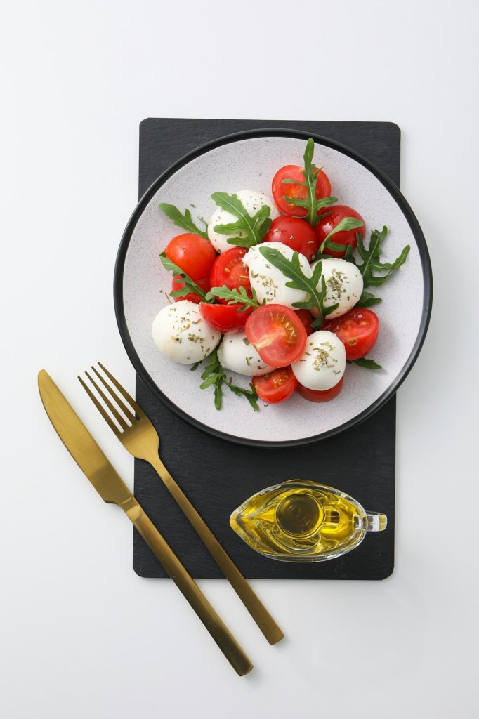 Concept of tasty Italian cuisine food - Caprese salad